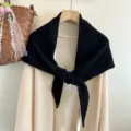 Black knit triangle scarf for women, warm wool shawl with cozy texture and stylish design details. - Black