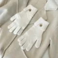Solid color knit touchscreen gloves with elegant wooden button, warm winter gear for women - One Size / Creamy White