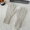 Solid color winter knit gloves for women, warm five-finger touchscreen design with ribbed cuff. - One Size / Beige