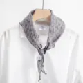 Detail shot of grey floral triangular scarf, cotton fabric, elegant neckerchief and hair accessory. - Light Gray