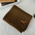 Brown knitted scarf for women with cute puppy embroidery, warm winter neck guard accessory. - Brown