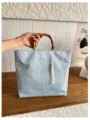 Chinesischer Stoffhandtasche mit Bambusgriff und Quaste, elegante modische Damentasche. - Mit Anhängern / Blau