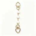 Golden metal heart bag charm with white enamel links stylish keychain accessory for women - White