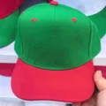 Color-blocked baseball cap detail showing green crown and red brim texture clearly. - Head Circumference 55-59cm / 5-Panel Green & Red