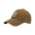 Close-up detail view of vintage washed brown baseball cap featuring stylish white phrase embroidery. - One Size / Coffee