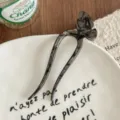 Marbled U-shaped hair fork with bow, ideal for chic bun styling and elegant daily hair accessories. - Obsidian Black
