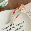 Colorful resin U-shaped hair stick with 3D bowknot, elegant bun maker styling tool for daily wear. - Multicolor