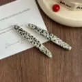 Acetate hair clip with gold lettering, chic black and white pattern for side bangs and styling. - 2 Pieces/Pack / Black Dots