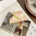 Medium acetate hair claw clip with elegant pink and white marbled pattern for daily styling. - Pink Green Floral