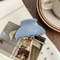 Elegant blue acetate hair claw clip for women, stylish medium size ponytail clamp accessory. - Blue
