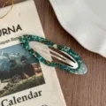 Detailed view of Korean retro green resin metal BB clip for chic side fringe styling. - Starry Sky Green