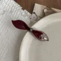 Elegant burgundy leaf spring hair clip, glossy finish with gold accent for sweet versatile daily styling. - Burgundy