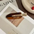 Dopamine acetate hair clip with tortoise shell pattern and gold metal clip for styling bangs. - Coffee