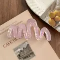 Detailed view of the pink wavy acetate hair claw featuring a stunning mermaid iridescent finish. - 11cm / Colorful Purple