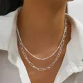 Elegante dubbellaagse zilveren ketting met sprankelende ketting en papierclipstijl. - Stijl 2449