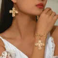 Gold-toned textured cross pendant earrings and toggle clasp chain bracelet jewelry set. - Gold Smooth Bracelet and Earrings