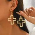 Gold-toned hollow cross drop earrings with textured metallic finish for stylish daily wear. - Gold Hollow Earrings