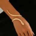 Bracciale da braccio serpente oro aperto, gioiello polsino serpentino metallico vintage. - Bracciale rigido / Oro