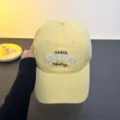 Yellow cotton baseball cap with stylish English embroidery, casual sun hat for men and women. - One Size / Yellow