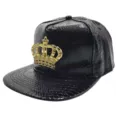 Black PU leather snapback cap featuring a detailed metallic gold crown badge for hip-hop style. - M (56-58cm) / Black
