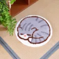 Detail shot of the cute sleeping cat round plush rug, soft texture for bedroom decor. - Blue Cat