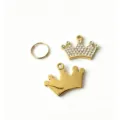 Detailed shot of gold crown pet pendant and ring charm with crystal rhinestones for collar. - White Crown