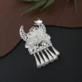 Detailed view of Chinese Miao silver filigree butterfly hair accessory featuring pearls and tassels. - P75