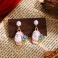 French retro Monet garden enamel flower Baroque pearl dangle earrings fine detail view. - Light Pink