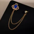 Elegant gold-tone crown brooch with blue teardrop crystal and long tassel chains for women. - Gold Crown Blue Gem Tassel Style (Z725)