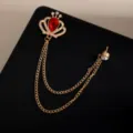 Golden crown brooch with red crystal and double tassel chains, elegant fashion jewelry accessory. - Gold Crown Red Gem Tassel Style (Z727)