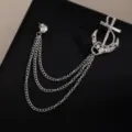 Elegant silver anchor brooch with shimmering rhinestones and multi-strand hanging chains. - Silver Anchor Tassel Style (Z729)