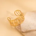 Exquisite gold-plated open cuff bracelet featuring an intricate geometric hollow design style. - Irregular Wave Style / Gold