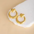 Exquisite gold heart geometric stud earrings detail, minimalist stylish metal accessory display. - E4669-3