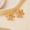 Gold floral stud earrings with honeycomb textured petals and central bead for women fashion. - E4924
