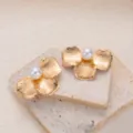 Gold hollow leaf pearl earrings variant, retro metallic minimalist design fashion jewelry. - E4604-2