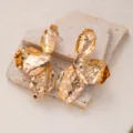 Gold metallic irregular leaf earrings, vintage statement design for women and girls daily wear. - E4678-2