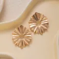 Gold textured hollow leaf ear studs, stylish geometric metal variant earrings for women. - E4845