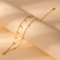 Minimalist stainless steel double-layer gold bracelet with crystal and flower pendants for women. - S810