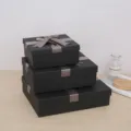 Luxury black rectangular gift boxes featuring elegant grey ribbons, ideal for birthdays. - Gift Box / Small 15x15x7cm