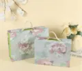 Detailed view of vintage floral gift boxes with handles, showing exquisite artistic pattern design. - Small Size 28.6x22.5x8.8cm / Silver Green
