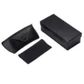 Black leather folding sunglasses case with cleaning cloth and storage box detail view - Three-Piece Leather Case Set