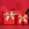 Red gift boxes with gold ribbon bows, perfect for holiday and festival gift packaging. - Small Gift Box 15x15x7cm / Gold & Red