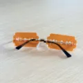 Fashion razor blade sunglasses for women, rimless metal frame with orange ocean lenses. - Orange Blade