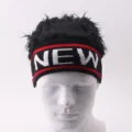 Detail view of the knitted wig cap with unique letter pattern and faux hair design for daily wear. - Black Headband With NEW Black Wig