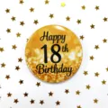 Close-up detail view of the black and gold 18th birthday tinplate badge with shiny glitter finish. - Happy 18th Birthday Style (A) / Black & Gold