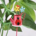 Metal watering can garden stake with ladybug and flowers for potted plant decoration. - Bucket Ladybug Red