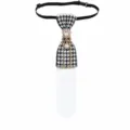 Details of the pre-tied houndstooth necktie featuring rhinestones, pearl chain and white accent. - White