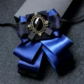 Elegant blue satin bow tie with vintage bronze gem center for men formal suit wedding wear. - Dark Blue