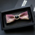 Elegant men's bow tie with jacquard plaid fabric and sparkling rhinestone center crystal accent. - Gold and Red Plaid