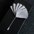Elegant men's lapel pin with grey plaid fabric fold design for formal suits and wedding wear. - Striped Light Grey
